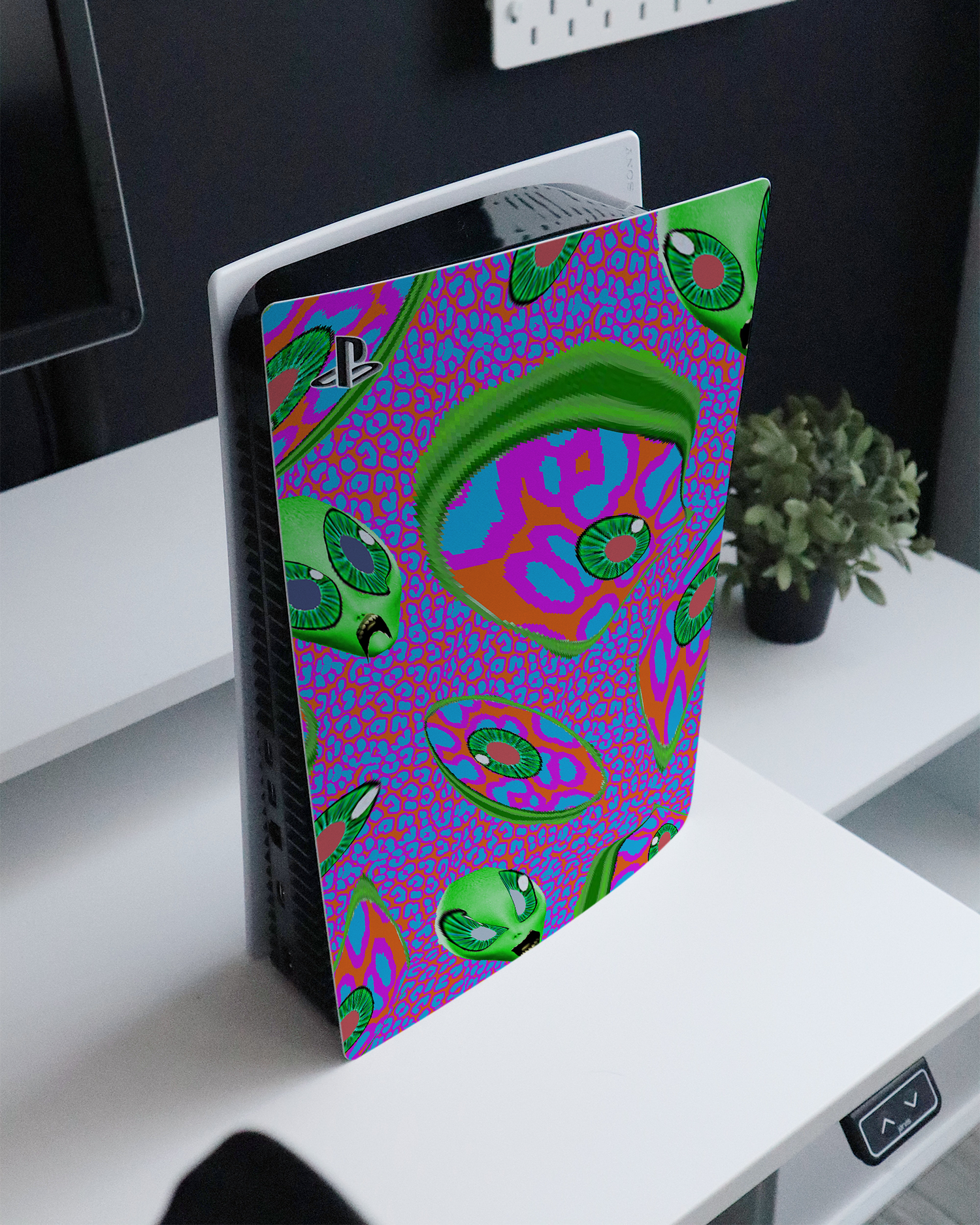 Alien Trip Console Skin for Sony PlayStation 5 Digital Edition standing on a sideboard 