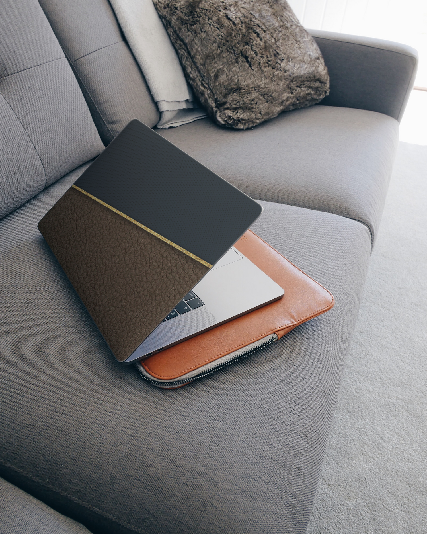 Oxford Laptop Skin for 15 inch Apple MacBooks on a couch