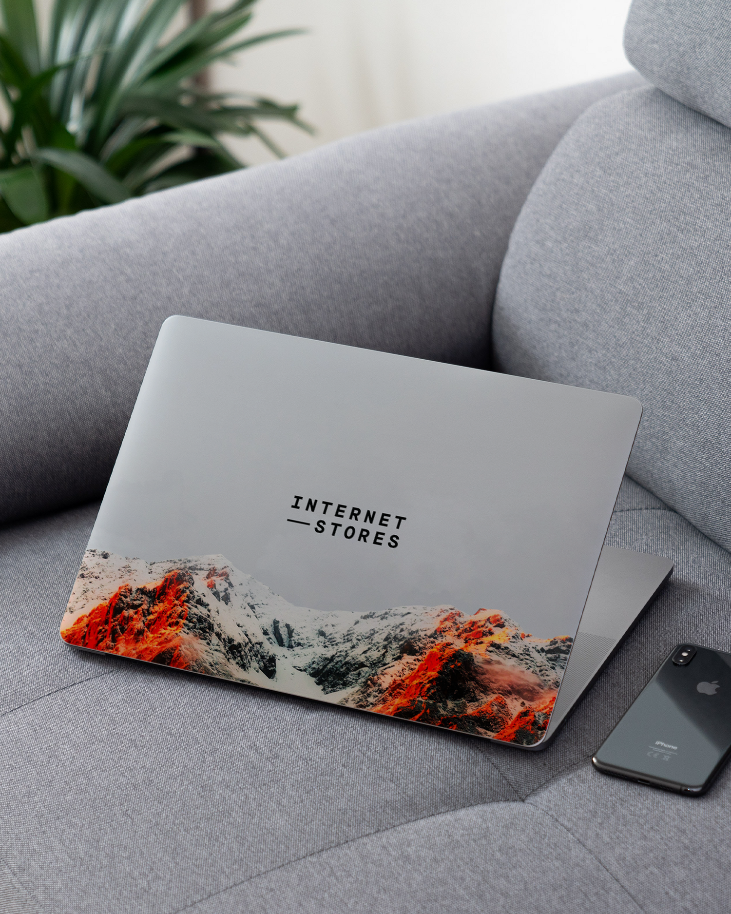 High Peak Laptop Skin for 13 inch Apple MacBooks on a couch